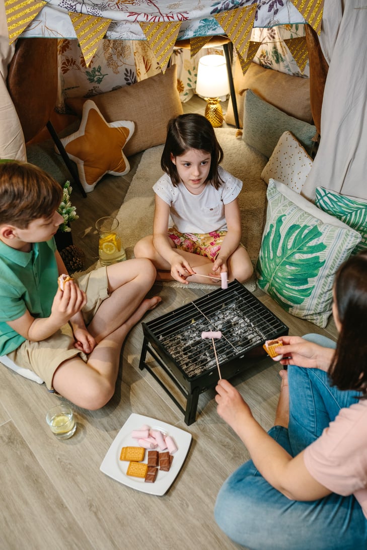 Family Roasting Marshmallows Indoors 